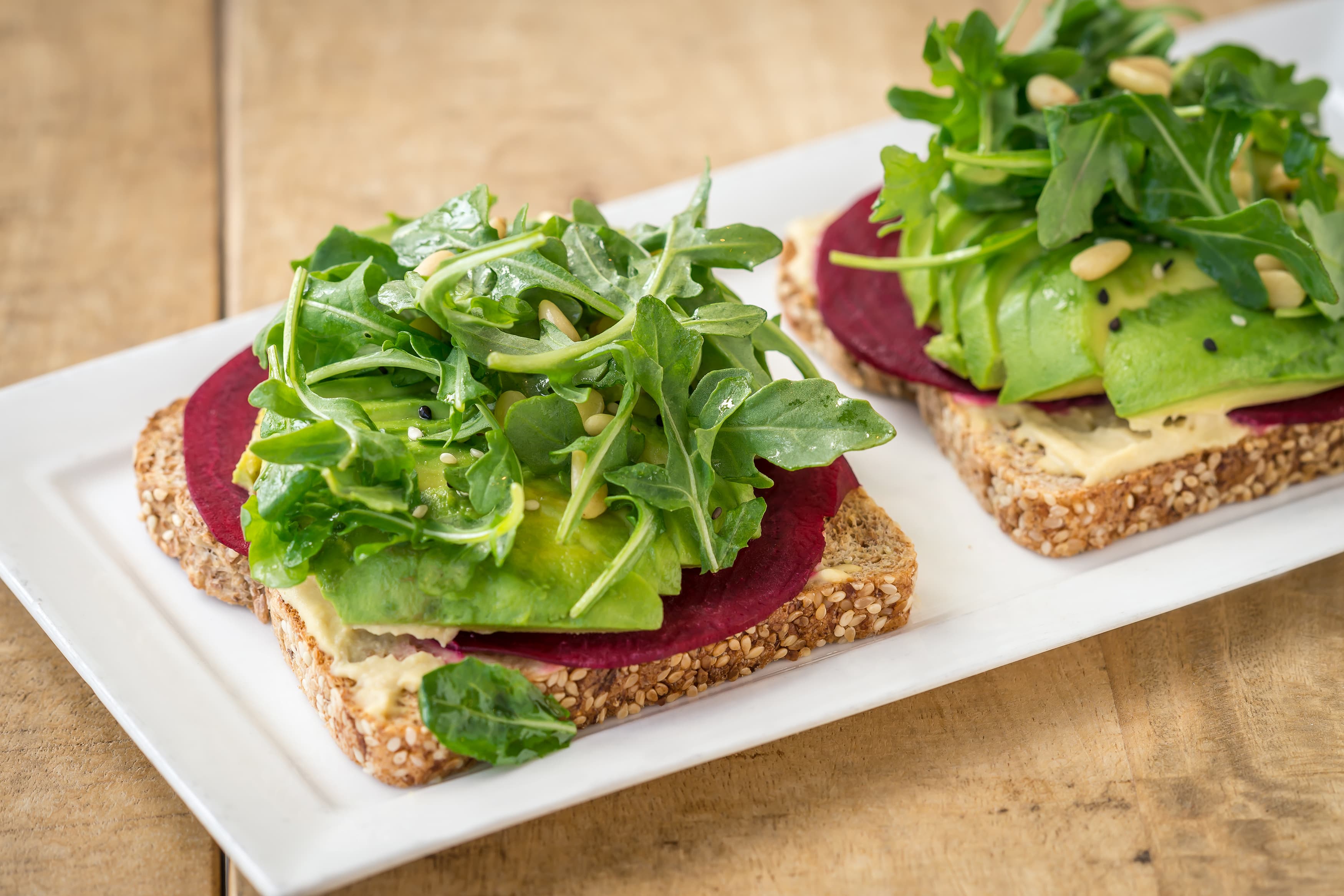 Beet and arugula toast on whole grain